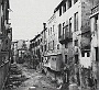 1957. La Riviera dei Ponti Romani vista dal ponte di Porta Altinate, direzione Cassa di Risparmio
